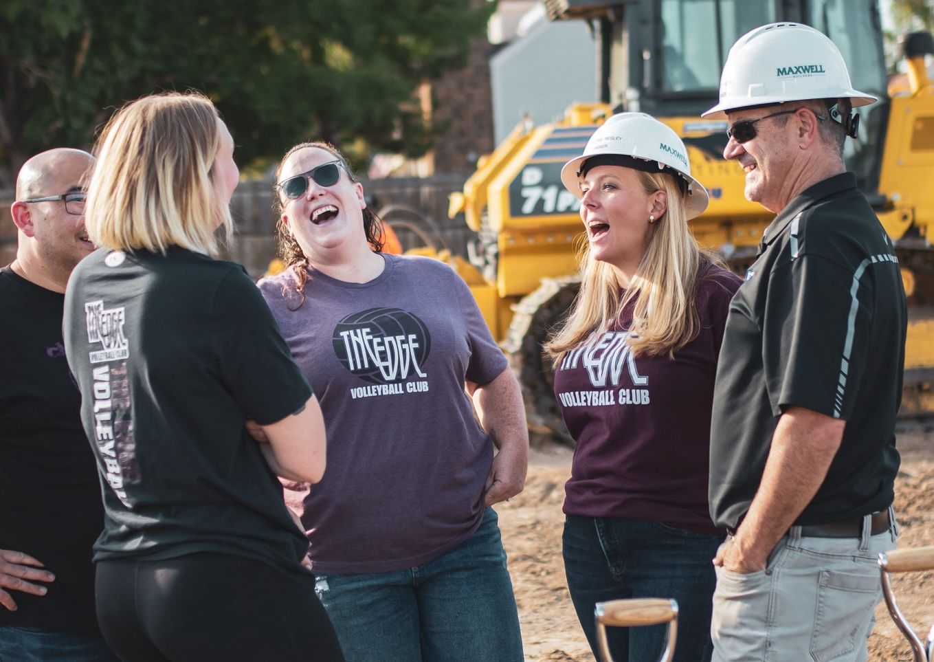 Directors and owners share a laugh at the ground breaking