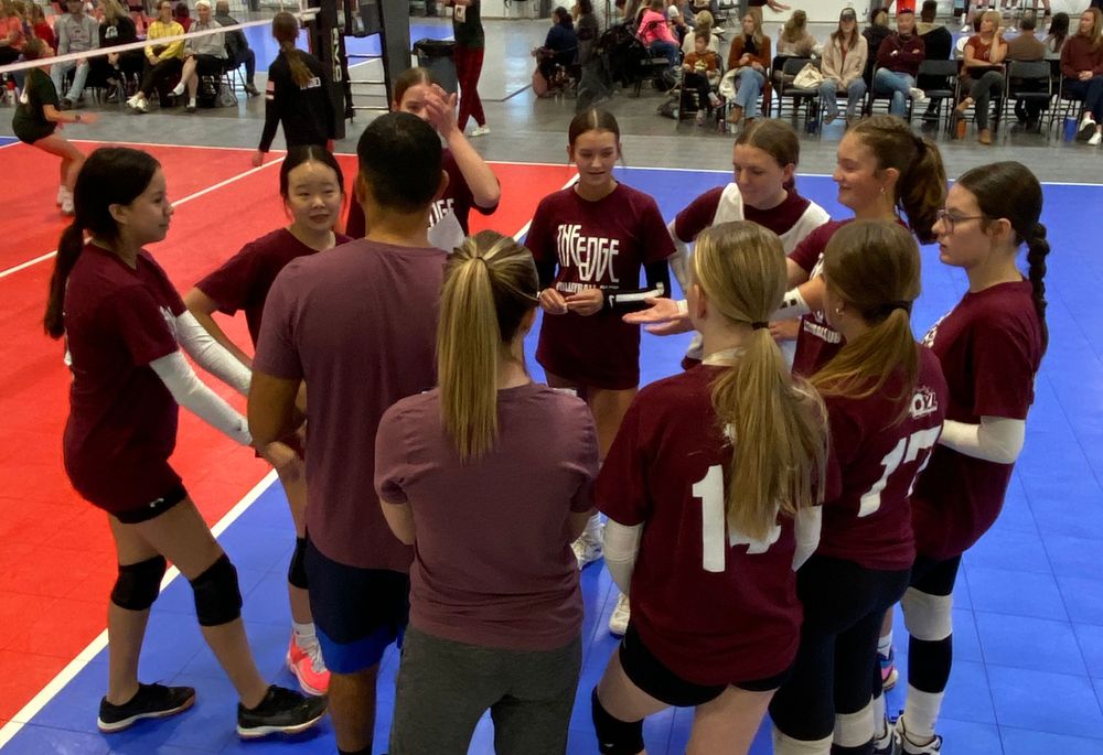 14 Anthunee huddles during a time out